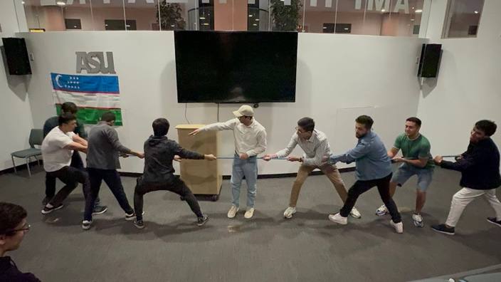 Students playing tug of war at Uzbekistan Culture Day